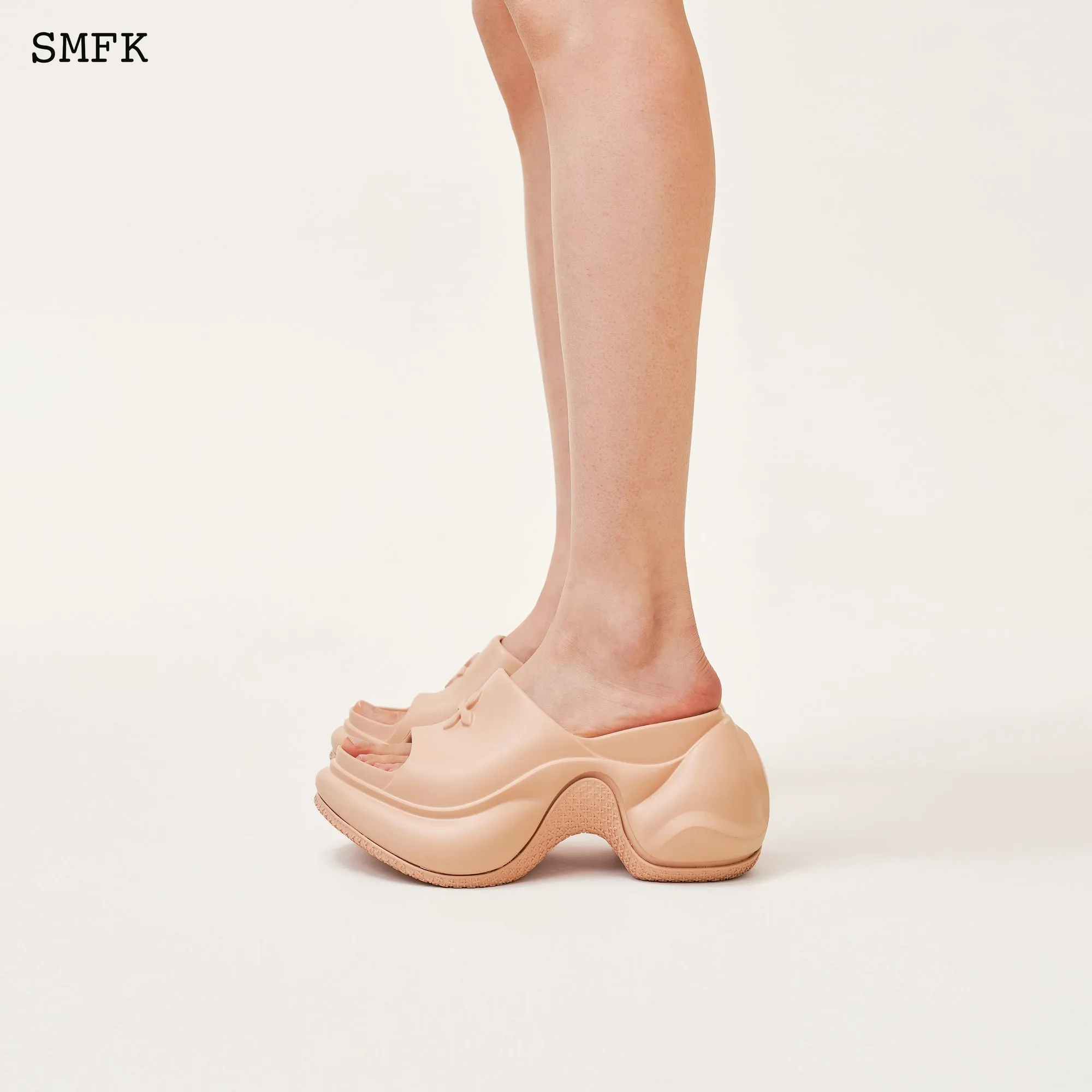 Compass Wave High-Heel Bumper Sandal In Nude